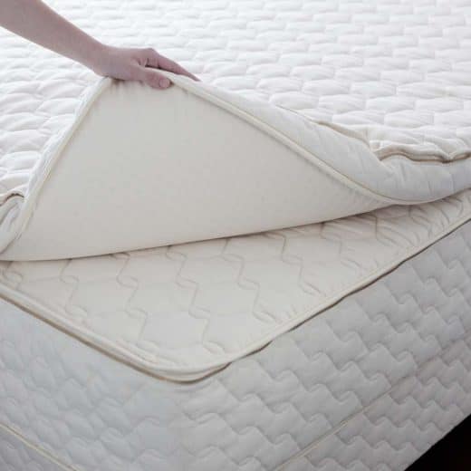 The Harmony organic latex mattress topper  stands four inches tall and is detachable