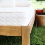 Innerspring mattress on a natural platform bed