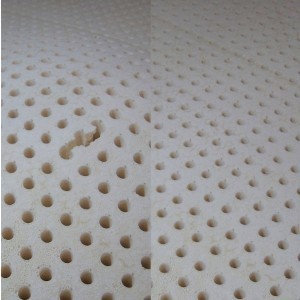 Small tear in surface (left). Laid flat (right side, same sheet).