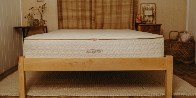 Natural platform bed made of sustainably-sourced wood.